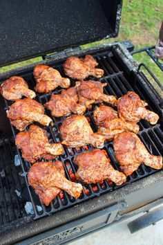 chicken is cooking on the grill outside