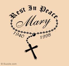 a rosary with the words rest in peace and mary on it