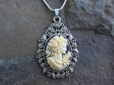 For sale are beautiful flawless (victorian woman with butterfly) cameo pendant necklaces!!!! Gorgeous!!! They are offered at a reasonable price, make perfect gifts, and are wonderful quality!!!!  The cameo is set in an ornate tibetan silver setting, and the chain is 22" .925 silver plated 1.2mm snake chain, with a lobster claw clasp!!!!  I make several varieties, colors, styles and matching sets!!!!  I will be glad to do special requests or matching pendant, cuff bracelet and/or brooch if you do Woman With Butterfly, Antique Cameo Jewelry, Creepy Baby Dolls, Enamel Locket, Cameo Pendant Necklace, Victorian Pendants, Picture Pendant, Cameo Jewelry, Wire Necklace