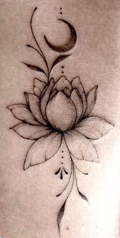 a woman's stomach with a lotus tattoo on it