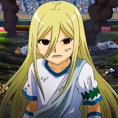 an anime character with long blonde hair standing in front of a stadium full of people