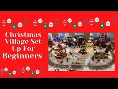 the christmas village set up for beginners is displayed in front of a red background