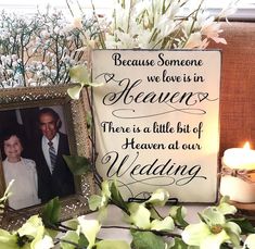 there is a sign that says because someone we love is in heaven there is a little bit of heaven at our wedding