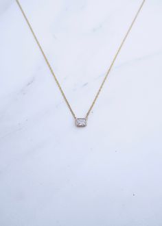 ⟡ Gold filled CZ square bezel⟡ Gold filled chain⟡ Gold filled clasp⟡ Gold filled adjustable chain from 16" to 18" Elegant Square Necklaces With Adjustable Chain, Square Pendant Necklace With Adjustable Chain, Square Pendant Necklace With Bezel Setting For Gift, Necklaces With Adjustable Chain And Square Pendant, Gold Jewelry With Bezel Setting And Square Cut, Gold Square Cut Jewelry With Bezel Setting, Gold Square Cut Bezel Set Jewelry, Bezel Necklace, Chain Gold