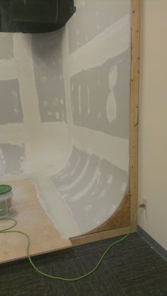 the room is being prepared for painting and remodeling