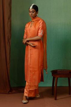 Rust orange silk kurta featuring a V neck, half sleeves, and placement vintage motif. Paired with a tissue stripe pattern straight pant and an organza embroidered dupatta with tasselled edges., Fit: Relaxed Tissue Dupatta, Dupatta Border, Silk Pant, Kurta Set For Women, Indian Dresses Traditional, Dresses Traditional, Silk Kurta, Embroidered Dupatta, Women Kurta