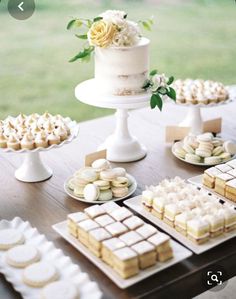 a table topped with lots of desserts and cakes