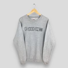 Vintage Nike Block Embroidery Gray Sweatshirt Medium 90s Nike Spell Out Pullover Nike Just Do It Sportswear Jumper Nike Baggy Sweater Size M Size On Tag :- Size M Manual Measurement :- WIDTH (armpit to armpit) :- 20" inches LENGTH (shoulder to end of garment) :- 28" inches WEIGH :- 0.42 kg Condition :- Good Condition. No holes and no stains. - Colors Might Be Different Due To Lighting. - All items are VINTAGE which show some signs of wear and tear. FEDEX EXPRESS = 3-6 business day arrived Please Pull Nike, Baggy Sweater, Nike Jumper, Baggy Sweaters, 90s Nike, Gray Sweatshirt, Nike Vintage, Fedex Express, Nike Just Do It