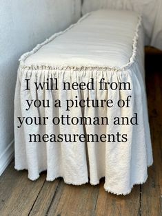 a bed with a white bedspread on top of it and a quote about measurements