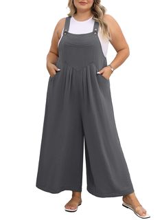 PRICES MAY VARY. FABRIC COMPOSITION: Plus size overalls for women made of 100% polyester, lightweight, soft, drapey, breathable and durable ADJUSTABLE STRAPS: (Inseam- 22.64 inches) Wide legs, four pockets, three coconut buttons to adjust the length of the jumpsuit. ROOMY PLUS SIZE JUMPSUIT: ample waist and leg space, hiding your tummy ,flattering your plump figure PLUS SIZE JUMPSUIT FOR CURVY WOMEN: It looks cute with a graphic tee, plain white tee, tank top, or even a light cardigan sweater in Outfit Ideas For Plus Size Women, Plus Size Fashion For Women With Belly, Plus Size Boutique Clothing, Plus Boho, Casual Summer Rompers, Summer Rompers, Flowy Jumpsuit, Beach Shopping, Jumpsuit For Women