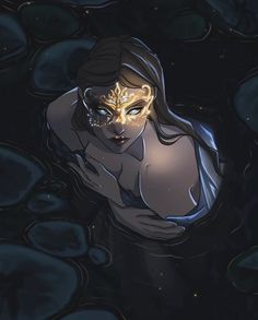 a woman in the water with her face painted gold