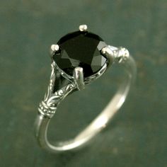 Classic Black Spinel Promise Ring, Classic Black Spinel Ring For Formal Occasions, Classic Black Spinel Ring Jewelry, Elegant Black Spinel Ring For Formal Occasions, Classic Formal Black Spinel Rings, Classic Black Spinel Jewelry With Polished Finish, Classic Black Spinel Ring For Anniversary, Elegant Black Spinel Ring, Classic Black Spinel Ring