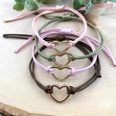 Delicate boho chic style bracelet, made of waxed cord and 18K gold plated heart charm. Designed for everyday wear. This dainty boho heart bracelet enhance your casual weekend outfit. String Heart, Adjustable String Bracelet, Wax Cord Bracelet, Bracelet String, Letter Charm Necklace, Gold Heart Bracelet, Casual Weekend Outfit, Dainty Initial Necklace, Pink Olive