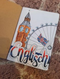 an open book with the word english written in front of a clock tower and british flag