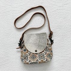 New Without Tag. Please See All Photos For More Details. Smoke Free. Fast Shipping. Check Out My Page, Bundle And Save! Measures Approximately 8.5" W X 8.5" H X 4.5" D, 19" Maximum Drop. Two-Section Crossbody Bag Made With Combination Of Leather, Rug-Like Canvas With Ethnic Print And Hairon In Grey, White And Brown. Western / Boho Style Made From Upcycled Materials. * Exterior Flap With Snap Closure Covers Two Lined Compartments With Zip Closures * Removable And Adjustable Leather Strap * Zipper Gray Crossbody Shoulder Bag For Daily Use, Gray Crossbody Bag With Leather Handles, Gray Leather Handles Crossbody Shoulder Bag, Gray Leather Handle Crossbody Shoulder Bag, Gray Crossbody Bag For Everyday Use, Gray Crossbody Satchel With Removable Pouch, Gray Crossbody Bag With Cell Phone Pocket, Gray Crossbody Shoulder Bag, Gray Crossbody Bag With Adjustable Strap