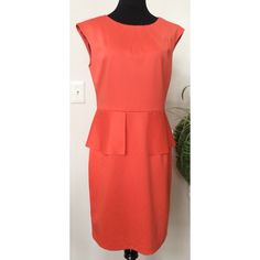 Ggh/13h/030423). Nwt! Beautiful New Nine West Coral Sleeveless Knee Length Sheath Peplum Dress Size 12, Msrp $99. Features Sleeveless Pleated Round Neck Sheath Dress With Back Zip And Eye Closure. Waistline Cutout Style Peplum Design. Orange Inner Lining For Comfort. Note: All Measurements Are +/-2 Inches. Please Enlarge Pictures To See Details And Review Measurements Below As Fit Is Different For Each Individual. Excellent Condition. Approx. Measurement: Length: Shoulder To Bottom 39" Bust: Pit Summer Peplum Dress For Work, Summer Workwear Peplum Dress, Summer Peplum Workwear Dress, Orange Knee-length Dress For Work, Orange Sleeveless Knee-length Dress For Spring, Fitted Knee-length Sleeveless Orange Dress, Affordable Knee-length Sleeveless Dress With Button Closure, Orange Cotton Knee-length Dress, Peplum Designs