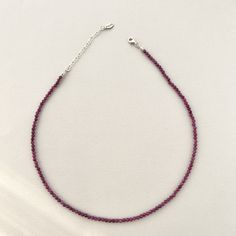 "Faceted Ruby Beaded Necklace and Bracelet in 925 Sterling Silver Details: Gemstone: Ruby Av Gemstone dimensions: 3 mm Necklace length: 40cm/16\"+extends to 45cm/18\" Bracelet length: 17cm/6.5\"+extends to 7.5cm/18\" Check out the full catalogue of beaded necklaces here: https://www.etsy.com/shop/PaleoGemsJewellery?section_id=40958762 🔹Please note  While you're checking out the photos, remember that each gemstone is like a fingerprint - totally unique. Colors and shapes play differently in each piece, making them one-of-a-kind.  Our pics are snapped under some bold lights to highlight their beauty, but your actual piece might have its own little variations. 🔹Caring for gemstones  Wait for your body lotions and perfumes to set in before you put on your jewelry. Ensure your jewelry is stor Sterling Silver Single Strand Beaded Necklaces, Sterling Silver Necklaces With Faceted Beads, Sterling Silver Rondelle Gemstone Beaded Necklace, Round Sterling Silver Single Strand Beaded Necklace, Sterling Silver Rondelle Jewelry With Silver Clasp, Sterling Silver Necklace With Faceted Round Beads, Sterling Silver Rondelle Necklace With Faceted Beads, Sterling Silver Necklace With Faceted Rondelle Beads, Sterling Silver Round Beaded Single Strand Necklace