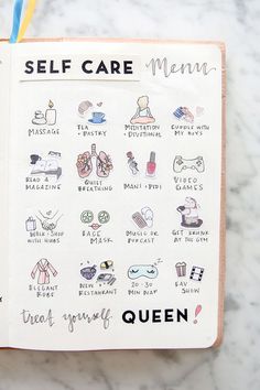 an open notebook with stickers on it and the words self care written in black