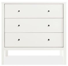 a white dresser with three drawers