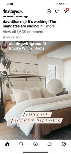 a bed with white sheets and pillows in a bedroom next to an instagram post