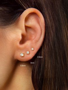 "A must-have in any jewelry collection, these dainty studs look beautiful with everything. Faceted round brilliant cubic zirconia hand-set in a high quality 4-prong setting. Discreet and undeniably classic, these are the perfect everyday stud earrings. ♦ SOLD AS A PAIR ♦ Size: Choose between 2.5mm, 3mm and 3.5mm at checkout. * D E T A I L S * ∙ Material: .925 Sterling Silver or 18K Gold Plated over .925 Sterling Silver ∙ Stone: White Zirconia ∙ Dimensions: 2.5mm or 3mm or 3.5mm ∙ Hypoallergenic First Earrings Studs, Seconds Ear Piercing Gold, Diamond Earrings Minimal, Double Ear Piercings Studs, Tiny Diamond Stud Earrings, 2 Holes Ear Piercing, Double Ear Piercing Earrings, Second Earlobe Piercing, Ear Piercings Seconds