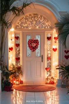 a front door decorated for valentine's day with lights and decorations