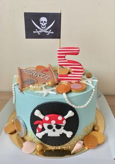 a birthday cake with a pirate theme on it