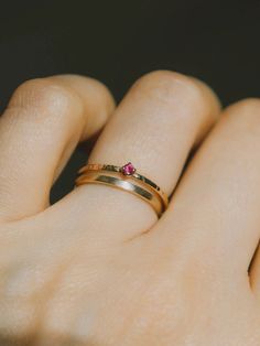 July’s birthstone - tiny ruby ring on our signature bark texture 14k yellow gold band. Dainty, delicate beauty. Perfect a lady who is not a fan of chunky gemstones, this ring won't get tangled in your clothes or hair. Match perfectly when you wear it with our dainty rings. Made of 14K yellow gold. Genuine ruby size 2 mm. Band width approximately 1.2 mm. Ruby Solitaire Ring, Bark Texture, Dainty Rings, Delicate Beauty, Ruby Sapphire, Ruby Ring, Dainty Ring, A Lady, Gift Accessories