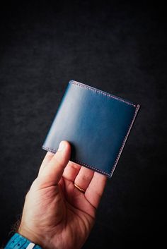 * DIMENSIONS: At 10 x 10 x 1,5cm when folded, our traditional men's wallet is light and compact yet boasts plenty of capacity. It was designed for the man on-the-go - the adult that appreciates handsome aesthetics, top-notch quality, functional and stylish design. * PREMIUM QUALITY LEATHER: Premium Quality Buttero and Italian made Goat leather are luxury kinds of leather. Because you deserve the best in quality, our wallet is made from premium top leather, which is equally luxurious as it is lon Blue Trifold Wallet With Card Slots, Elegant Blue Bifold Wallet, Blue Bifold Wallet, Handmade Blue Rectangular Wallet, Blue Leather Wallets For Daily Use, Personalized Mens Wallet, Luxury Leather-lined Wallets For Daily Use, Engraved Wallet, Mens Wallet