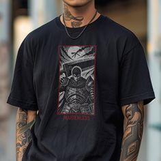 Unleash your inner warrior with our exclusive Berserk T-shirt featuring the legendary Guts in an epic battle pose. This shirt, designed in a vintage manga style, showcases intricate linework and intense shading reminiscent of the iconic Berserk comics. The bold text "Maidenless" adds a touch of the series' dark humor, making this a must-have for any true Berserk fan. ---------------------- .: Made with 100% Airlume combed and ring-spun cotton, a lightweight fabric (4.2 oz/yd² (142 g/m that is easy to layer, breathable. Perfect for active and leisure wear.  .: The retail fit that is perfect for casual and semi-formal settings. The crew neckline adds a classic, neat style that's perfect for accessorizing. .: Bella+Canvas manufactures all its products in the US and internationally in humane, Guts Anime, Berserk T Shirt, Metal Shirt, Vintage Manga, Metal Shirts, Epic Battle, Anime Tees, Manga Style, Elden Ring