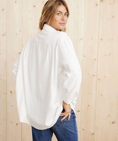 Relaxed Oversized Shirt Ivory With a dramatically oversized fit, this staple piece redefines style versatility. Tucked, untucked, or half-tucked depending on your mood—the Relaxed Oversized Shirt is as crisp and put together as it is effortlessly cool for any occasion. Style it with classic denim or the Relaxed Trouser for a new take on your easy everyday uniform. 100% raw silk. Made in China. Oversized button-up shirt with a generous fit to provide a relaxed look and feel. | 100% raw silk. Made in China. Oversized button-up shirt. Dry clean. The body is generous to provide an oversized and relaxed look and feel. | Jenni Kayne Women's Relaxed Oversized Shirt Size Small Oversized Washed Button-up Shirt, Oversized Relaxed White Shirt, Oversized Neutral Button-up Top, Oversized White Poplin Shirt, Effortless Oversized Button-up Tops, Everyday Uniform, Jenni Kayne, Staple Pieces, Oversized Shirt