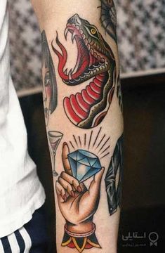 a man's arm with tattoos on it and a diamond in his hand next to a snake