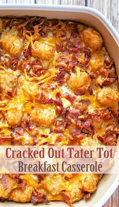 baked out tater tot breakfast casserole in a white dish on a wooden table