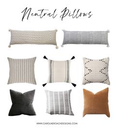 neutral pillows with black and white stripes on them, including one for the pillow in the middle