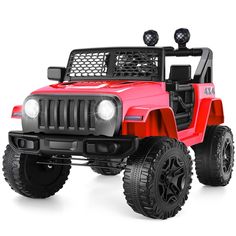 a red toy jeep with lights on it's front and back wheels, is shown