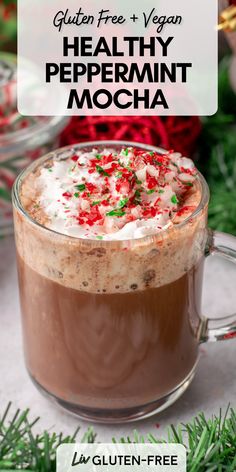 a cup of hot chocolate with whipped cream and sprinkles