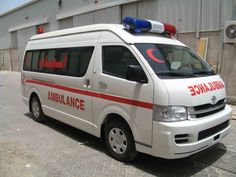 an ambulance parked in front of a building