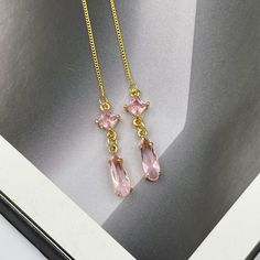 These are simple and beautiful teardrop crystal earrings. Pink crystals are framed in bright gold and dangling from long thread.  Measurements: The total length from the top of the hook to bottom - 4.13 inches (105 mm) approximately. Connector crystal: 5 mm x 5 mm Crystals: 12 mm x 4 mm These earrings would be a PERFECT GIFT for you and your family and friends!  Click here to see more Modern Everyday Earrings: https://www.etsy.com/shop/GrigorevaK?ref=seller-platform-mcnav§ion_id=27174357 Thank y Cheap Pink Dangle Jewelry, Cheap Pink Dangle Clip-on Earrings, Pastel Pink Dress Matching Earrings, Cheap Pink Drop Jewelry, Cheap Handmade Pink Crystal Earrings, Pink Wedding Earrings, Soft Pink Wedding, Earrings Prom, Pink Thread