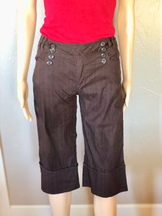 "These Vintage My Michelle, Size woman's Small, cuffed Crop Pants, brown small size crop pants are super tiny, they say they are a size 16 and are made in China, but please see measurements, I'm guessing a size 2-5 in US.  They are super adorable pants and in perfect vintage condition except the inside button appears to have been repaired.  These capri pants will make a perfect addition to your wardrobe, they look adorable with a tank top, or dressed up as well.  So many options.  Awesome Vintag Brown Cropped Leg Bottoms For Spring, Brown Cropped Leg Pants For Spring, Brown Cropped Leg Pants With Pockets, Brown Cropped Pants With Pockets, Stretch Cotton Brown Bottoms, Stretch Brown Cotton Bottoms, Mid Waist Pants, Brown Trousers, Womens Trousers