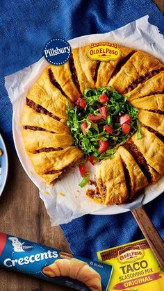 an image of food on the table with bread and other items to make it look like they are going to eat