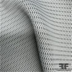 This futuristic looking fabric is a grey novelty mesh. The mesh is doubled with space in between making the fabric see through in some spots. This fabric has a two way stretch to it and is lightweight. SKU # - NOV 5119 Content – Poly Color – Grey Width – 40” Fabric Care - Dry Clean Only Engineering Tools, Fashion Fabric, Grey Fabric, Fabric By The Yard, Mesh Fabric, Fabric Care, Gray Color, Textiles, Yard