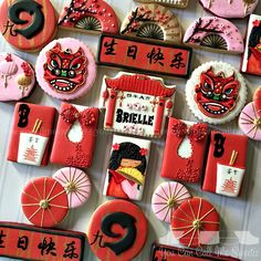 decorated cookies are arranged in the shape of geisha