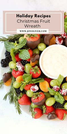 a platter filled with fruit and dip