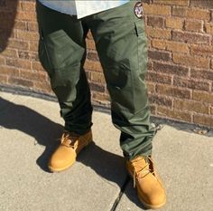 Army Green cargo pants. A necessity for every guy with style. The AYV Camo patch on the left thigh is our patch of approval. You can adjust the bottoms and the waist. Fully functional flyness. Green Casual Cargo Pants For Outdoor Work, Casual Green Cargo Pants For Outdoor Work, Casual Green Bottoms For Outdoor Work, Guy With Style, Army Green Cargo Pants, Green Cargo Pants, Green Cargo, Ll Bean Boot, Army Green