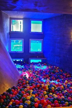 a room filled with lots of colorful balls