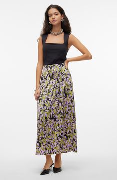 Delightful blooms romance this lightly draped skirt designed with a layered, asymmetric hem. 37" length (size Medium) Lined 51% recycled polyester, 49% polyester Machine wash, line dry Imported Summer Evening Skirt With Floral Print, Summer Evening Floral Print Skirt, Summer Evening Floral Skirt, Summer Floral Print Voluminous Maxi Skirt, Floral Print Voluminous Maxi Skirt For Summer, Spring Silk A-line Maxi Skirt, Voluminous Floral Print Maxi Skirt For Summer, Spring Printed Maxi Skirt, Chic Skirted Maxi Skirt With Floral Print