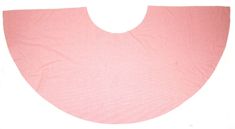 a pink bib laying on top of a white surface