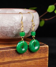 Regular Green Silver Overgild Jade Safety Buckle Drop EarringsMade of fine Sterling Silver Overgild Jade.Measurement: 3.8cm/1.482" * 3cm/1.17". Matches easily with daily hairstyle, dresses & Shirts Green Single Round Earring, Gold Jade Wedding Earrings, Single Green Round Earring, Gold Jade Earrings With Ear Wire, Donuts Earrings, Daily Hairstyles, Amulets, Silver Gifts, Green Jade