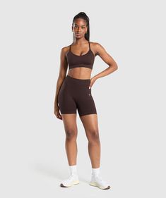 IT GIRL OF THE HIIT WORLD Strong, unapologetic, and a total baddie. We know you need a fit that matches your energy, and Sweat will make sure you look & feel confident before, during and after your workout (or hot girl walk). • Premium DYNMC™️ fabric is soft, breathable and durable• Ribbed, shaped waistband gives you maximum support, comfort and coverage throughout your session• Breathable eyelet detailing to the thighs• Move freely with a 4-way stretch design• Seamless design for full comfort & zero distractions SIZE & FIT• High-waisted• 5” inseam based on size M• Model is 5'9" and wears a size S• If you’re between sizes, size up. MATERIALS & CARE• Main: 83% Nylon, 9% Elastane, 8% Polyester.• Waistband: 74% Nylon, 16% Elastane, 10% Polyester• Machine wash cold with the sam Girl Walk, Seamless Shorts, Business Photoshoot, It Girl, Feel Confident, Energy, How To Wear