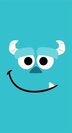 an image of a blue monster face with big eyes and horns on it's head